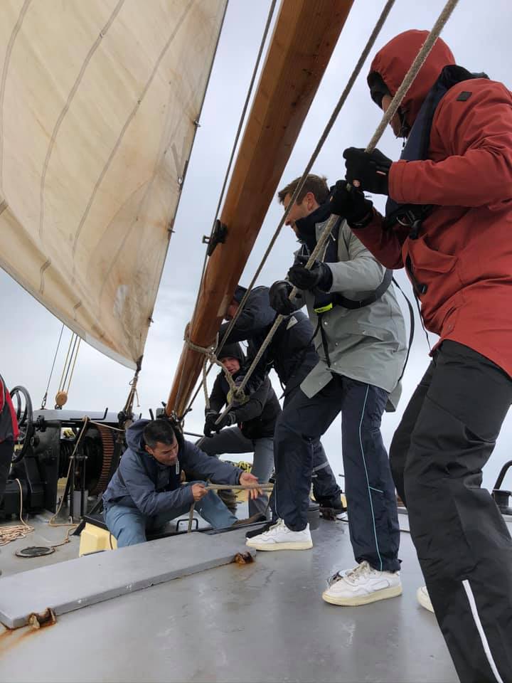 Working together on board during a weekend of sailing